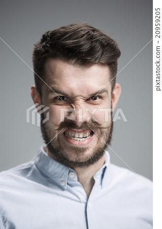 Close up face of angry man Close up face of angry man 20959205