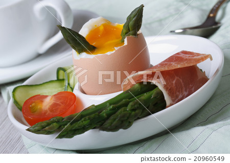 Boiled egg and green asparagus closeup. Horizontal 20960549