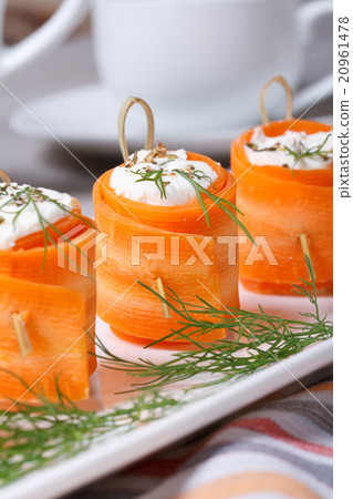 carrot rolls stuffed with feta cheese. Vertical 20961478