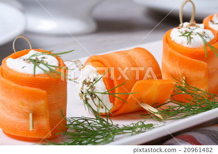 Rolls of fresh carrots with cheese and dill macro 20961482