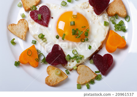 breakfast of fried hearts of vegetables and eggs breakfast of fried hearts of vegetables and eggs 20961537