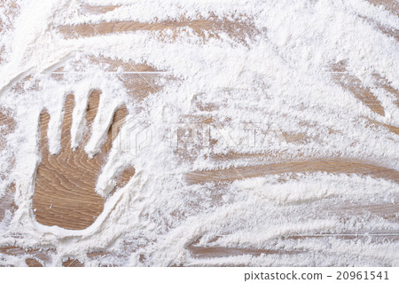 female palm print on flour scattered female palm print on flour scattered 20961541