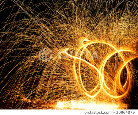 fire sparkler on black background. fire sparkler on black background. 20964879