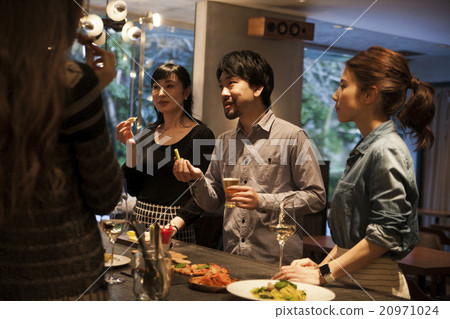 Men and women making a standing party 20971024