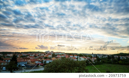 Sunset over village Sunset over village 20973759