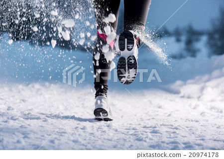 Winter running woman Winter running woman 20974178