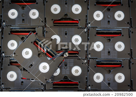 Abandoned pile of old useless mini DV 20982500