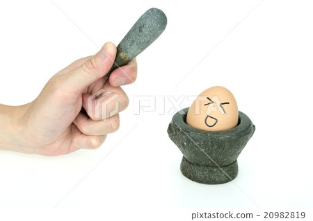 Egg on kitchen mortar isolated on white background Egg on kitchen mortar isolated on white background 20982819