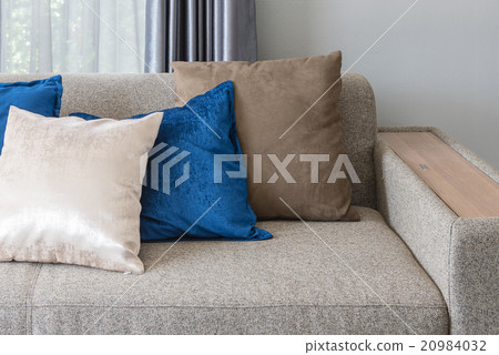 pillows on grey sofa in modern living room 20984032