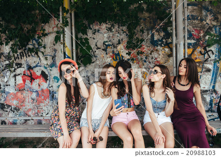Five beautiful young girls relaxing Five beautiful young girls relaxing 20988103
