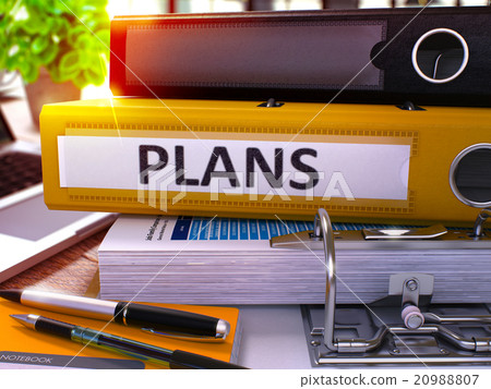 Plans on Yellow Office Folder. Toned Image. Plans on Yellow Office Folder. Toned Image. 20988807