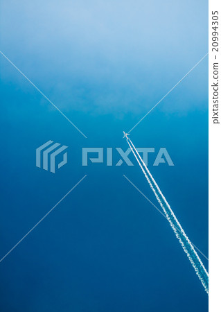 Airplane In Sky With Plane Trails Airplane In Sky With Plane Trails 20994305