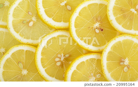 Close up sliced yellow lemon background texture Close up sliced yellow lemon background texture 20995164