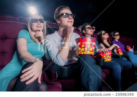People in the cinema wearing 3d glasses 20996399