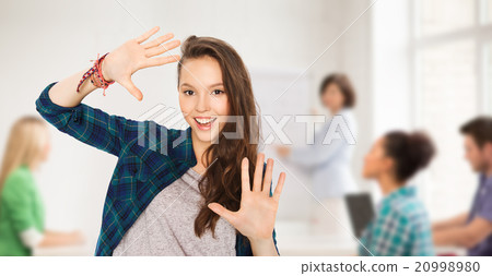 teenage student girl showing hands at school teenage student girl showing hands at school 20998980