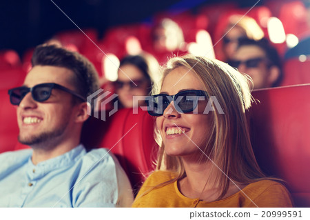 happy friends watching movie in 3d theater 20999591
