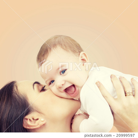 laughing baby playing with mother 20999597