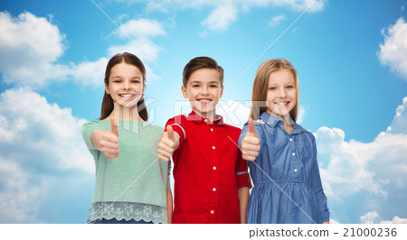 happy children showing thumbs up over blue sky happy children showing thumbs up over blue sky 21000236