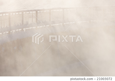 Railing in morning fog Railing in morning fog 21003072