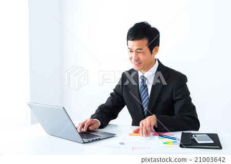 Salary man working in desk work men company employee business image office executive Salary man working in desk work men company employee business image office executive 21003642