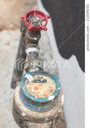 old meter of the water and metal pipes old meter of the water and metal pipes 21004050