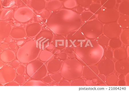 Macro shot of Olive oil mixed in water 21004240