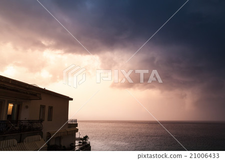 Coastal morning landscape, cloudy sky and house 21006433