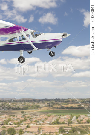 The Cessna 172 Single Propeller Airplane Flying In Sky 21008041