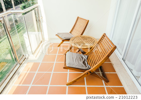 Empty chair and table Empty chair and table 21012223