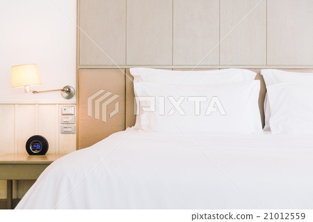 Pillow on bed 21012559