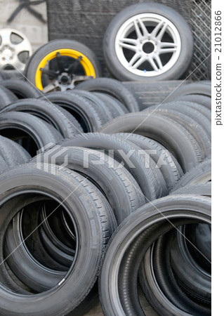 Pile of used rubber tyres. Pile of used rubber tyres. 21012866