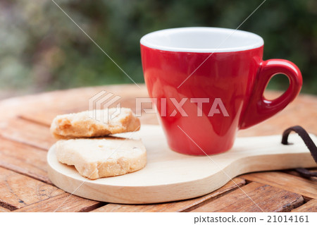 Cashew cookies with coffee cup 21014161