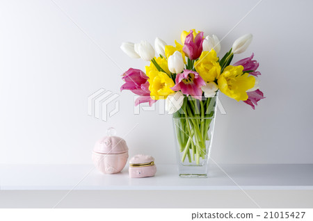 White background and three color tulips and vessels 21015427