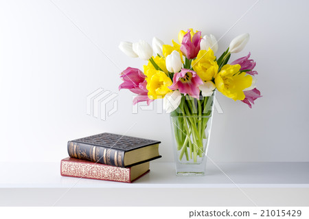 White background and three color tulips and books White background and three color tulips and books 21015429