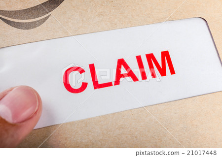 Claim form in brown envelope, insurance concept 21017448