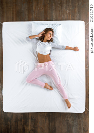 Top view photo of sleeping girl Top view photo of sleeping girl 21021719
