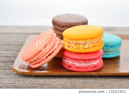 colorful macarons on wooden tray colorful macarons on wooden tray 21021951