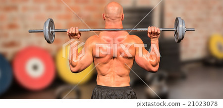 Composite image of rear view of bodybuilder lifting crossfit Composite image of rear view of bodybuilder lifting crossfit 21023078