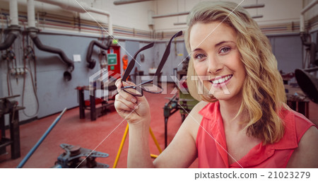 Composite image of pretty girl with glasses Composite image of pretty girl with glasses 21023279