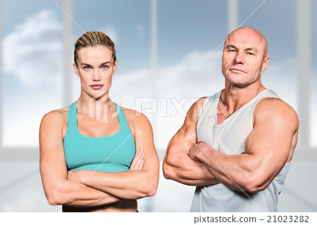 Composite image of portrait of athlete man and woman with arms c Composite image of portrait of athlete man and woman with arms c 21023282
