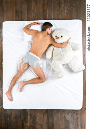 Top view photo of sleeping man 21023577