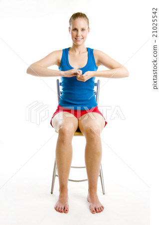 exercising woman sitting on chair 21025542