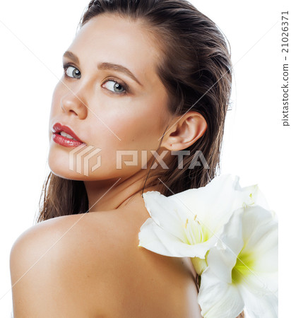 young pretty woman with  Amarilis flower close up 21026371