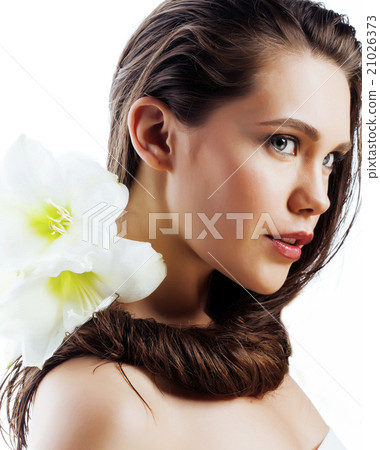 young pretty woman with  Amarilis flower close up 21026373