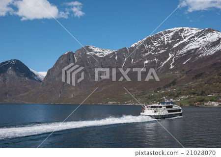 Passanger boat floating in Norwegian fjords Passanger boat floating in Norwegian fjords 21028070