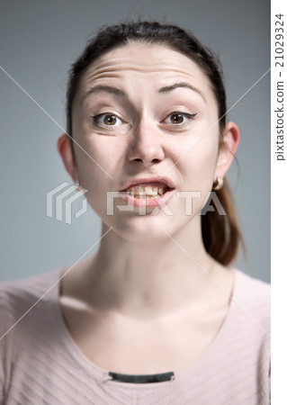 portrait of disgusted woman 21029324