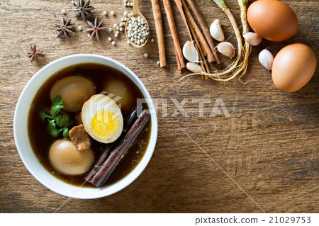 Eggs boiled in the gravy with spices. Thai cuisine 21029753