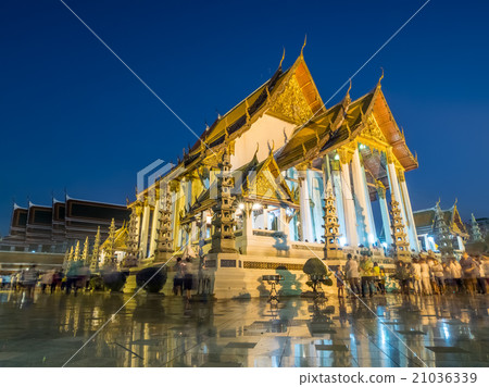 Candle lit in Thai temple Candle lit in Thai temple 21036339