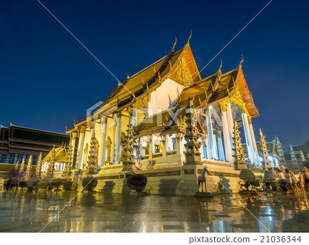 Candle lit in Thai temple Candle lit in Thai temple 21036344