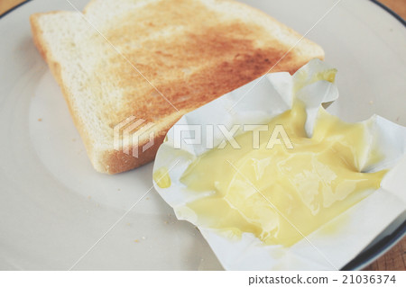 Slice toast bread with butter Slice toast bread with butter 21036374